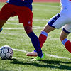 SOCCER IN NAVY AND RED UNIFORMS.jpg