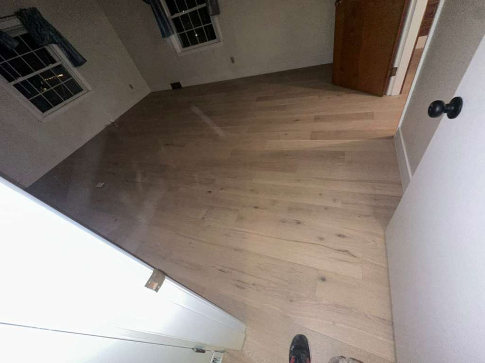 Modern MSI Bali Buff hardwood installation throughout a North Andover MA living room