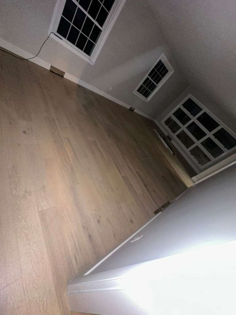 Modern MSI Bali Buff hardwood installation throughout a North Andover MA living room