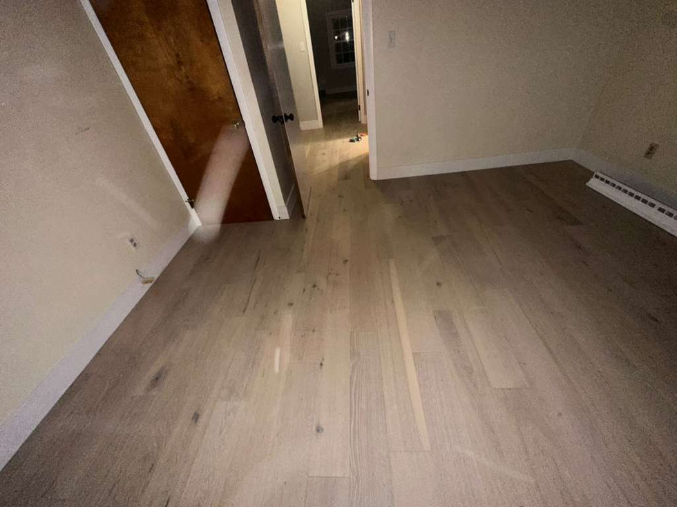 Modern MSI Bali Buff hardwood installation throughout a North Andover MA living room