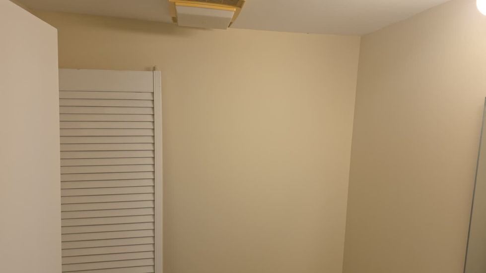 Modernized living room interior with clean, smooth paint finish in a Cambridge MA home.