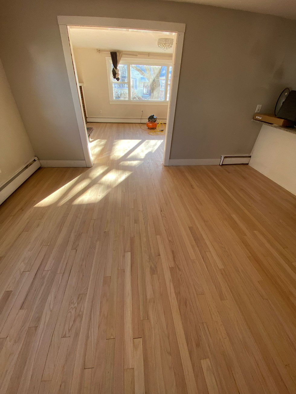 Meticulous hardwood floor sanding and restoration service completed in Watertown, Massachusetts.