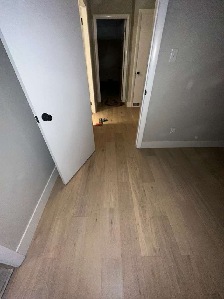 Modern MSI Bali Buff hardwood installation throughout a North Andover MA living room