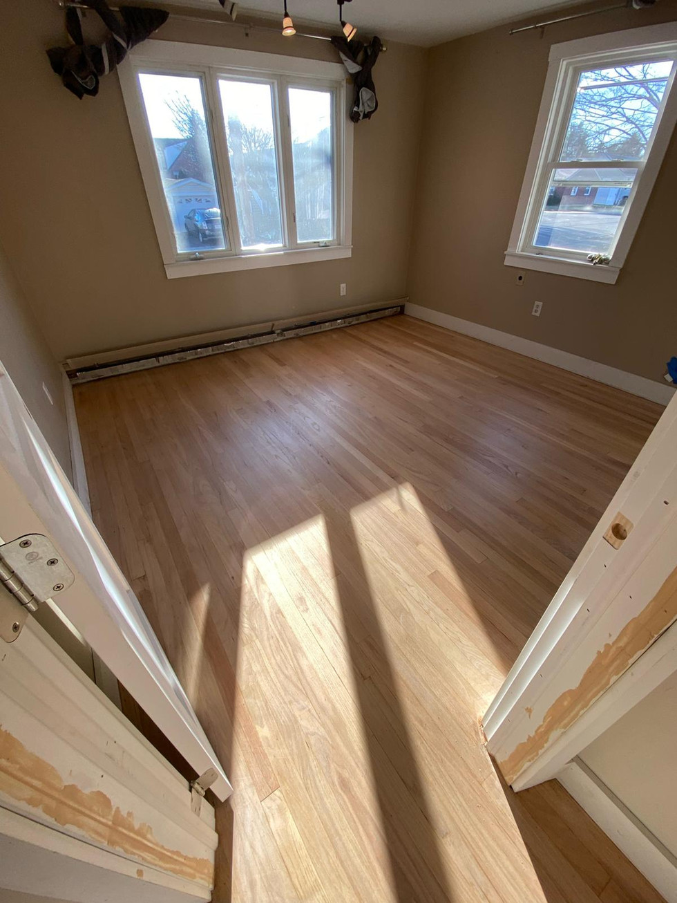 Meticulous hardwood floor sanding and restoration service completed in Watertown, Massachusetts.