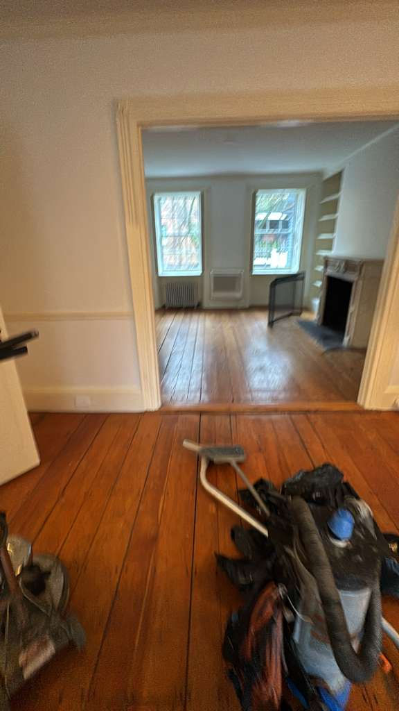 Refinished pine wood floors in Downtown Boston with 3 coats of Absco finish.