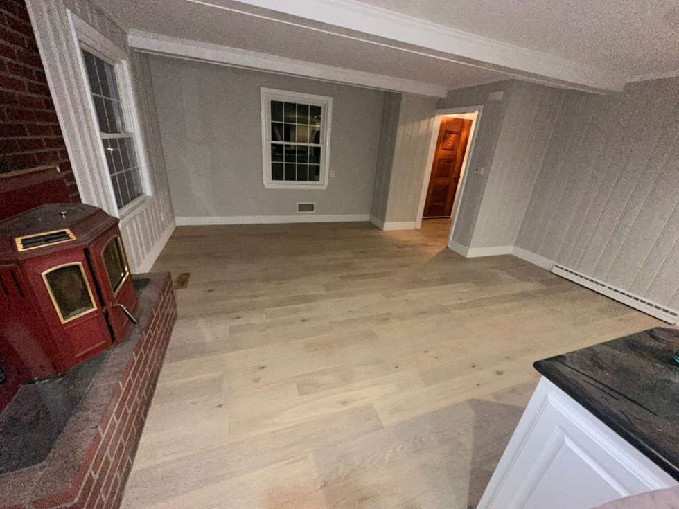Modern MSI Bali Buff hardwood installation throughout a North Andover MA living room