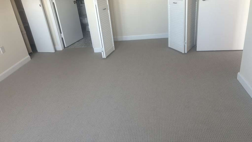 Modern hardwood floor installation in a high-rise Boston condo overlooking Mass Ave.