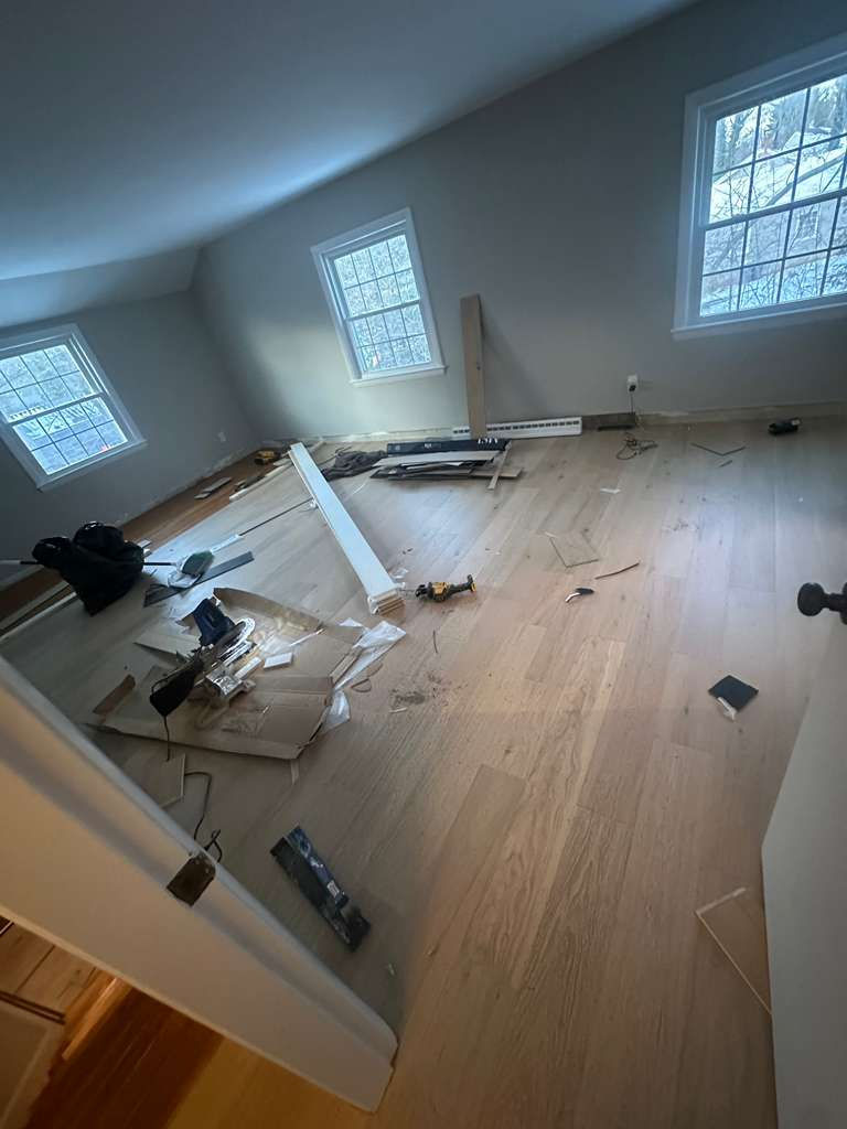Modern MSI Bali Buff hardwood installation throughout a North Andover MA living room