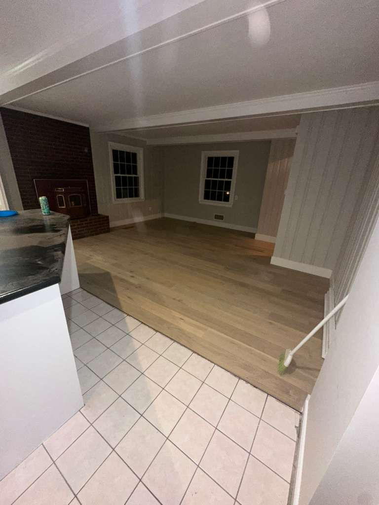 Modern MSI Bali Buff hardwood installation throughout a North Andover MA living room