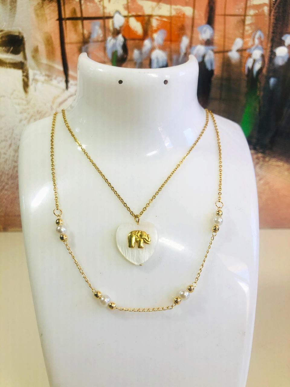 Perla cultivada y concha nacar