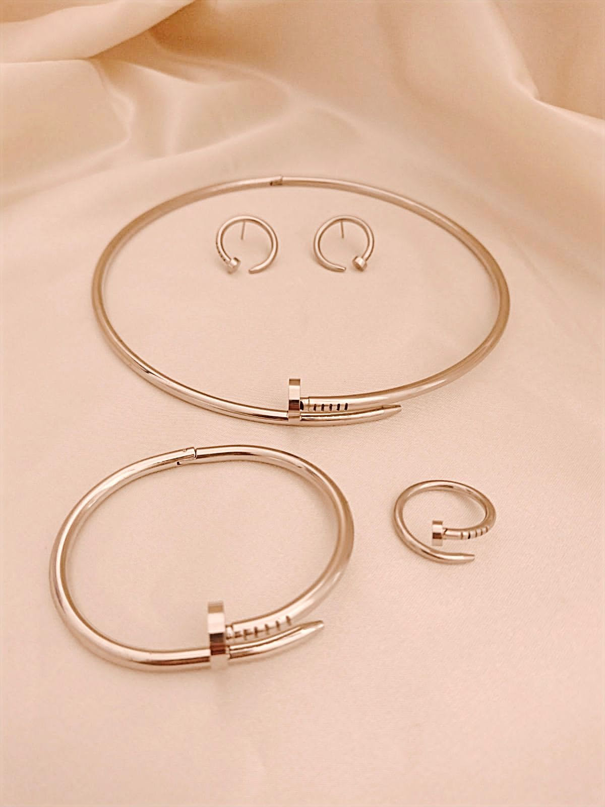 Set de omega de acero plateado