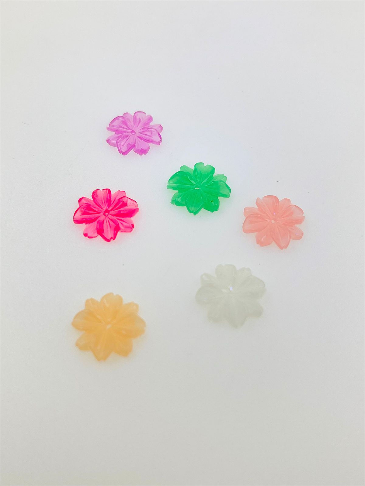 Dije flor de colores