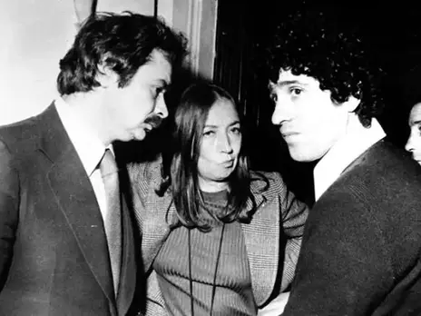 Alekos Panagulis, Oriana Fallaci e Ninetto Davoli alla camera ardente di Pier Paolo Pasolini allestita alla Casa della cultura in piazza Campo de' Fiori. Roma, 5.11.1975/ Archivio Storico Olycom/Tutti i diritti riservati