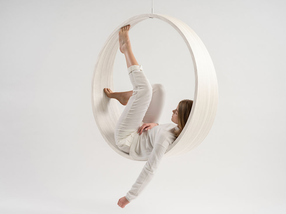 Thumbnail: Swing model n.2 indoor acts as a gentle rocking chair in four colours