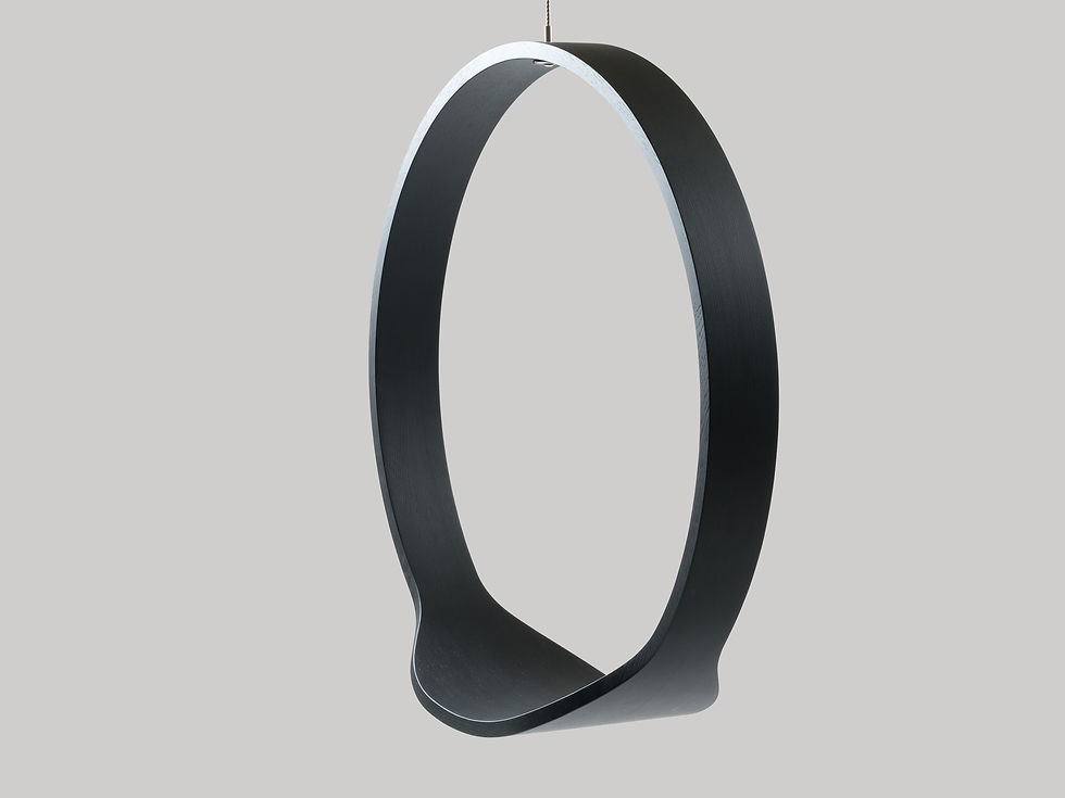 Thumbnail: Swing model n.1 indoor acts as a contemporary rocking chair in four colours