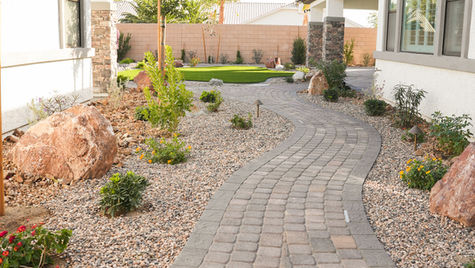 Las Vegas xeriscape with winding path and drought-tolerant plants