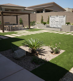 Artificial turf installation Las Vegas in backyard patio.