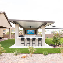 Artificial turf installation Las Vegas in an outdoor kitchen.