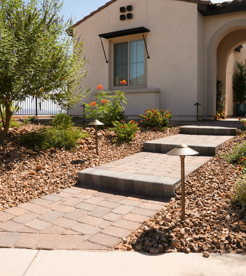 Stone paver walkway leading to a house entrance, Pavers and Landscaping, LivingWaterLV.