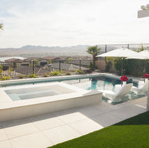 Luxury pool and spa overlooking a scenic mountain view