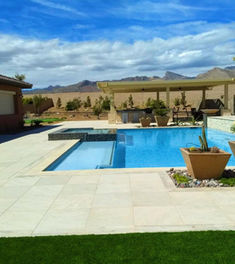 Stunning pool and landscape design with mountain views in the background