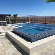 Luxury pool and spa with breathtaking mountain views and landscaped surroundings