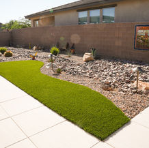Green artificial turf pathway in a backyard, Artificial Turf & Putting Greens.