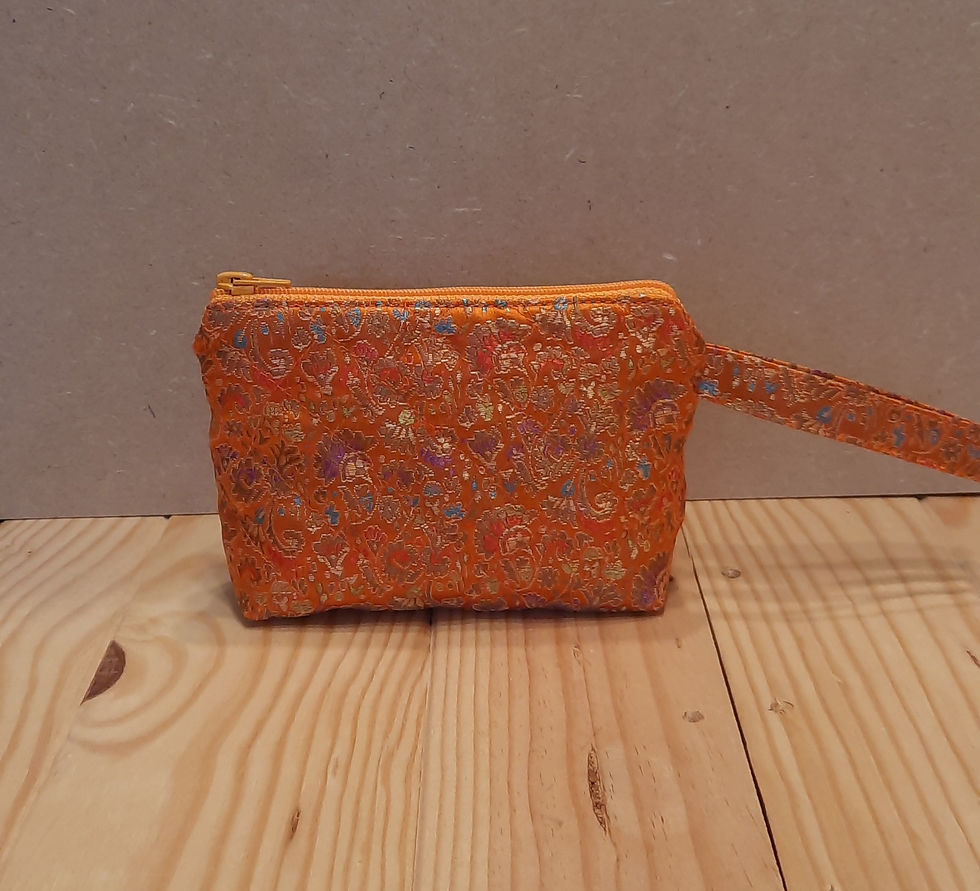 Petite trousse matelassée 14 cm orange avec motifs