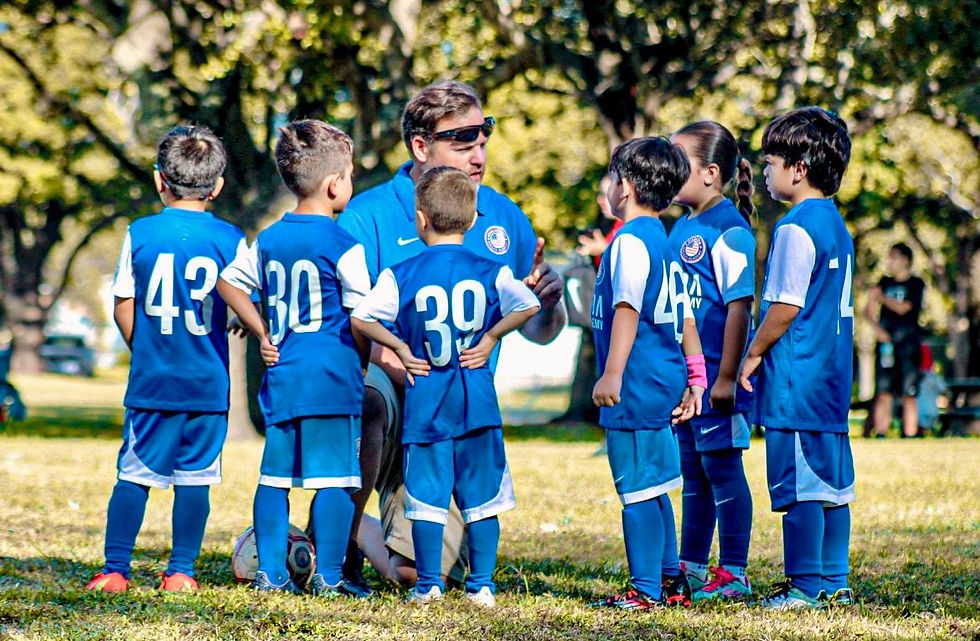 Players listening at DSA, South Florida, Top Formative Soccer Academy