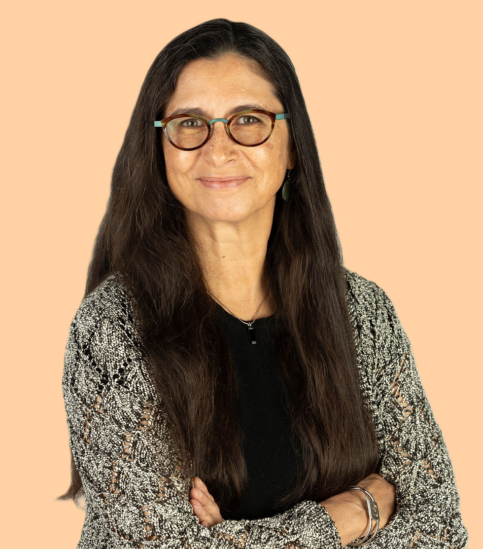 Headshot_MRey_light orange background.jpg