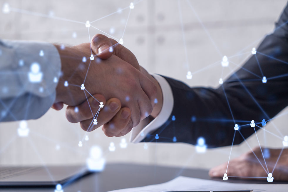 Handshake between two professionals with digital network overlay symbolizing business connections.