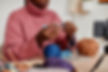 close-up-unrecognizable-young-africanamerican-woman-knitting-home-copy-space copy.jpg