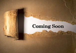 Torn paper box with word coming soon in