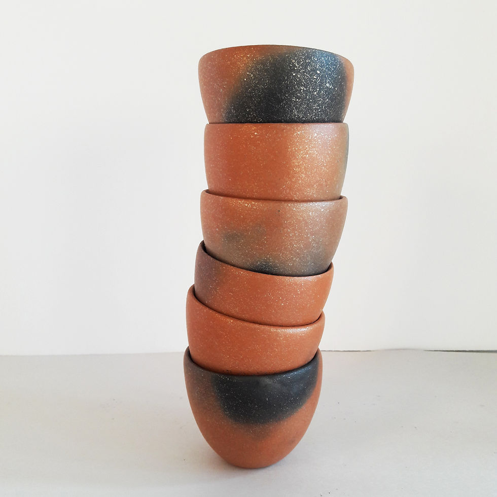 small stack of mica clay cups