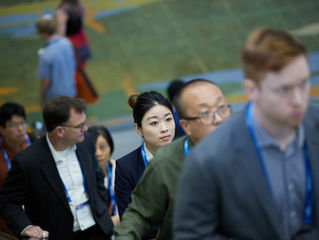 Attendees arrive at Boston Convention Center