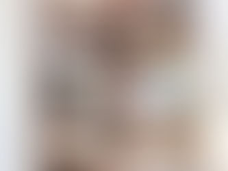 A homeschool book case with books and pencils