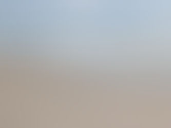 sandy beach with waves on the shore