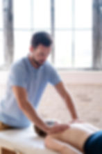 medium-shot-doctor-massaging-back.jpg