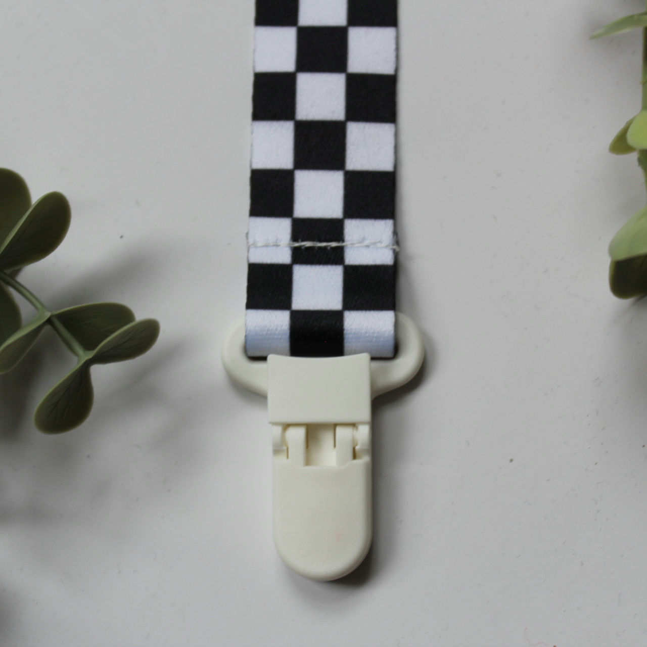 Attache-suce en tissus pour bébé