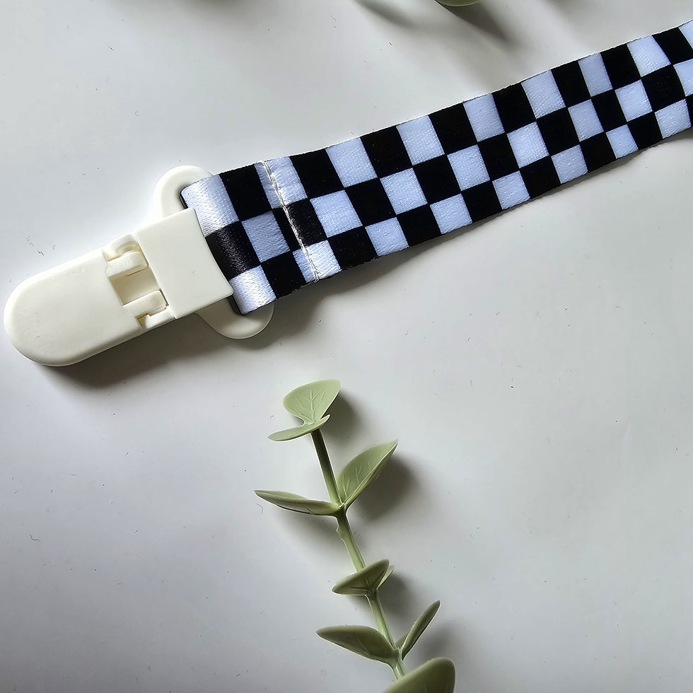 Thumbnail: Attache-suce en tissus pour bébé aux motifs originale