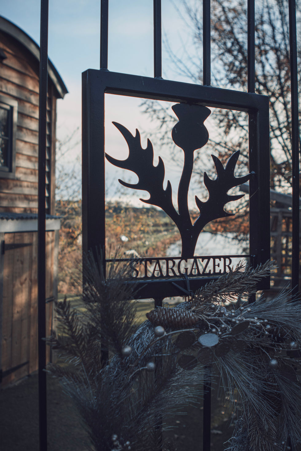 A luxury lifestyle photograph highlighting the landscape, accommodation, and calm atmosphere of a country resort. The image showcases the experience through soft lighting, thoughtful composition, and a relaxed, high-end aesthetic.