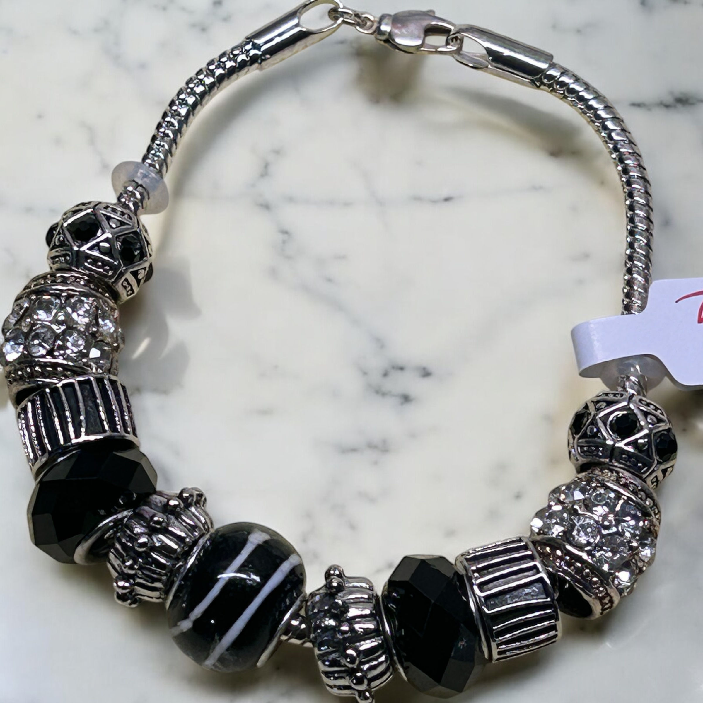 Black, elegant, flexible, charm bracelet