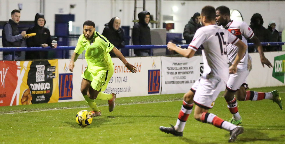 Luke Ifil brings the ball forward against Dulwich Hamlet in the London Senior Cup