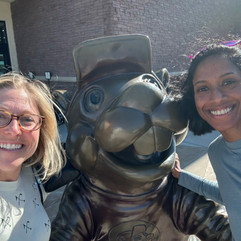 Two women in front of Buc-ee's Mascot Statue