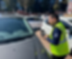 parking enforcement officer issuing citation on unauthorized vehicle in private property lot knoxville Tennessee