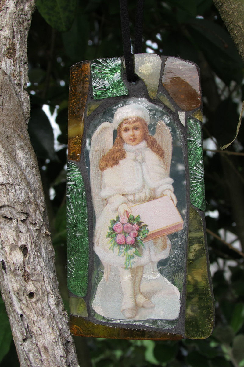 Girl with box stained glass mosaic ornament/suncatcher