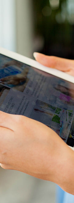 Person Holding Tablet