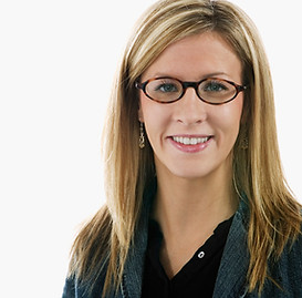 Smiling teacher in reference to our online school's teaching team