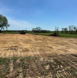Horse arena construction with quality footing and drainage in Kentucky.