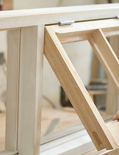 Carpenter Assembling Newly Made Windows